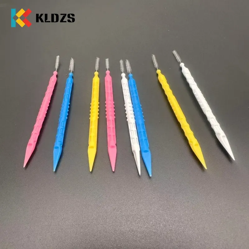 Scuab Interdental cruth cnámh éisc